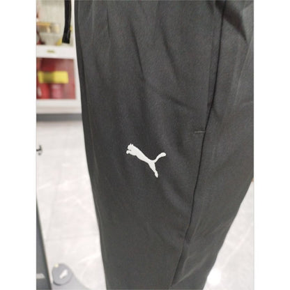 ESS Woven Pants op PUMA Black 692331-01